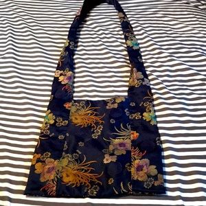 World of good cross body bag
